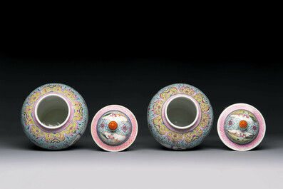 A Chinese famille rose covered vase and a pair of small covered vases, Qianlong mark, 20th C.