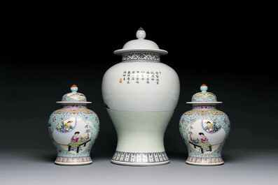 A Chinese famille rose covered vase and a pair of small covered vases, Qianlong mark, 20th C.