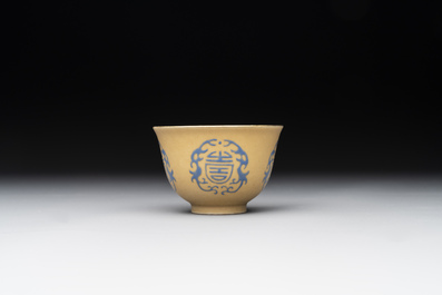 A Chinese blue enamel on gilt &lsquo;Shou&rsquo; cup, 19th C.