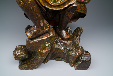 A large Japanese polychromed and gilt-lacquered wood figure of a divine general, Edo, dated 1623