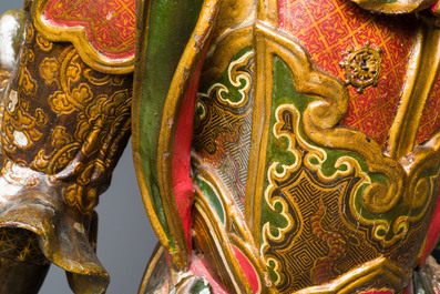 A large Japanese polychromed and gilt-lacquered wood figure of a divine general, Edo, dated 1623