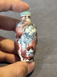 A Chinese blue, white and copper-red 'dragon' snuff bottle, Chenghua mark, 18th C.