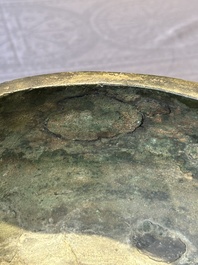 A Chinese archaic bronze tripod food vessel, 'ding 鼎', Han