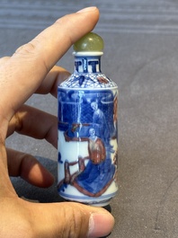 Two Chinese blue, white and copper-red snuff bottles and a blue and white 'crab' snuff bottle, Chenghua and Qianlong mark, 19th C.