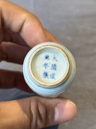 Four Chinese blue, white and copper-red snuff bottles, Yongzheng and Daoguang mark, 19th C.