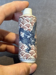 Two Chinese blue and white snuff bottles and two blue, white and copper-red snuff bottles, Yongzheng and Qianlong mark, 19th C.