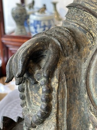 An important and large Chinese gilt bronze Buddha on a lotus throne, Ming