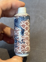 Two Chinese blue and white snuff bottles and two blue, white and copper-red snuff bottles, Yongzheng and Qianlong mark, 19th C.