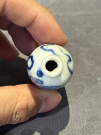 Nine Chinese blue and white snuff bottles, Kangxi and Qianlong mark, 19th C.