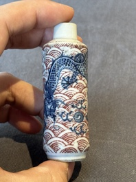 Two Chinese blue and white snuff bottles and two blue, white and copper-red snuff bottles, Yongzheng and Qianlong mark, 19th C.