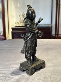 A fine Chinese bronze figure of a divinity, Ming