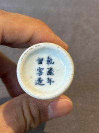 Two Chinese blue and white snuff bottles and two blue, white and copper-red snuff bottles, Yongzheng and Qianlong mark, 19th C.