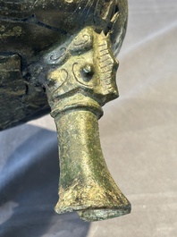 A Chinese archaic bronze tripod food vessel, 'ding 鼎', Han