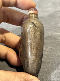 Seven Chinese smoky quartz, agate and hardstone snuff bottles, 19/20th C.