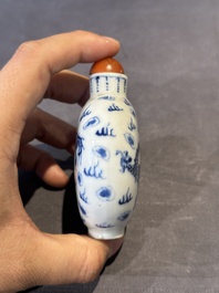 Three Chinese blue, white and copper-red snuff bottles and a blue and white snuff bottle, Qianlong mark, 19th C.