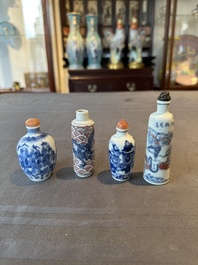 Two Chinese blue and white snuff bottles and two blue, white and copper-red snuff bottles, Yongzheng and Qianlong mark, 19th C.
