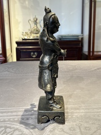 A fine Chinese bronze figure of a divinity, Ming