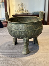 A Chinese archaic bronze tripod food vessel, 'ding 鼎', Han