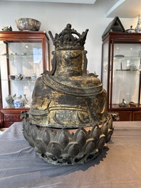 An important and large Chinese gilt bronze Buddha on a lotus throne, Ming