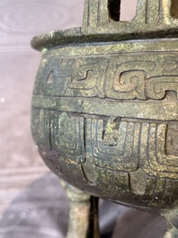 A Chinese archaic bronze tripod food vessel, 'ding 鼎', Han
