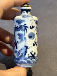 Two Chinese blue and white snuff bottles and two blue, white and copper-red snuff bottles, 19th C.