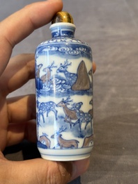 Three Chinese blue, white and copper-red snuff bottles, Yongzheng mark, 19/20th C.