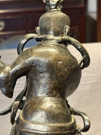 A fine Chinese bronze figure of a divinity, Ming