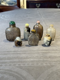 Seven Chinese smoky quartz, agate and hardstone snuff bottles, 19/20th C.