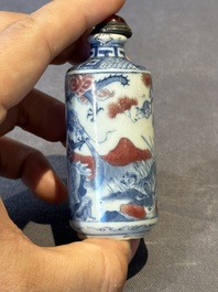 Three Chinese blue, white and copper-red snuff bottles, 19th C.