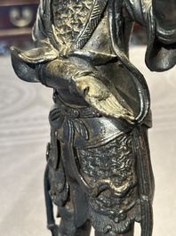 A fine Chinese bronze figure of a divinity, Ming