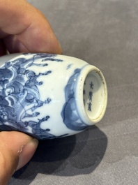 Two Chinese blue and white snuff bottles and a blue, white and copper-red snuff bottle, Yongzheng mark, 19th C.
