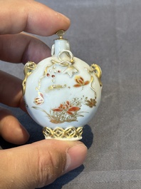 A Chinese iron-red and gilt-decorated snuff bottle, Yongzheng/Qianlong