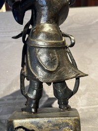 A fine Chinese bronze figure of a divinity, Ming