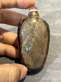 Seven Chinese smoky quartz, agate and hardstone snuff bottles, 19/20th C.