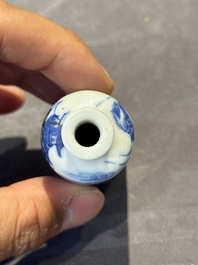 Two Chinese blue and white snuff bottles and a blue, white and copper-red snuff bottle, Yongzheng mark, 19th C.