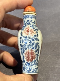 A Chinese blue, white and copper-red snuff 'deer' bottle, Yongzheng mark and of the period