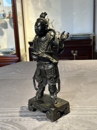 A fine Chinese bronze figure of a divinity, Ming