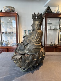 An important and large Chinese gilt bronze Buddha on a lotus throne, Ming