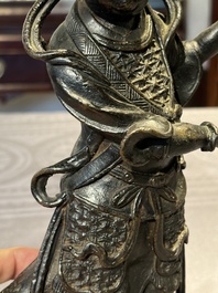 A fine Chinese bronze figure of a divinity, Ming