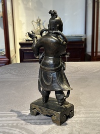 A fine Chinese bronze figure of a divinity, Ming