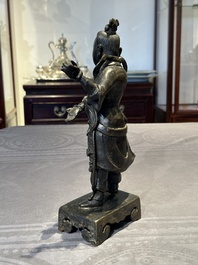 A fine Chinese bronze figure of a divinity, Ming
