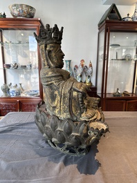 An important and large Chinese gilt bronze Buddha on a lotus throne, Ming