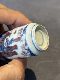Three Chinese blue, white and copper-red snuff bottles, 19th C.