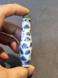 Two Chinese blue, white and copper-red snuff bottles and a blue and white 'crab' snuff bottle, Chenghua and Qianlong mark, 19th C.