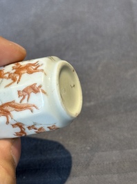 A Chinese iron-red and grisaille snuff bottle with monkeys at the Shuilian cave, 19th C.