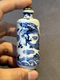 Two Chinese blue and white snuff bottles and two blue, white and copper-red snuff bottles, 19th C.