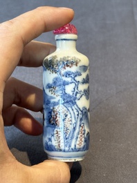 Two Chinese blue, white and copper-red snuff bottles and a blue and white 'crab' snuff bottle, Chenghua and Qianlong mark, 19th C.