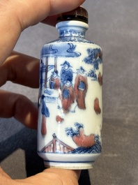 Three Chinese blue, white and copper-red snuff bottles, 19th C.
