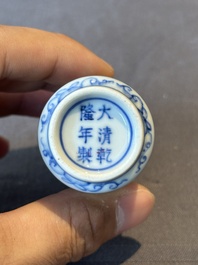 Two Chinese blue, white and copper-red snuff bottles and a blue and white 'crab' snuff bottle, Chenghua and Qianlong mark, 19th C.
