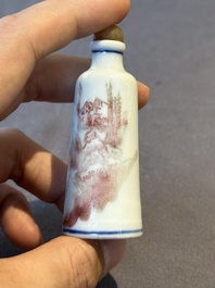 Two Chinese blue and white snuff bottles and two blue, white and copper-red snuff bottles, 19th C.